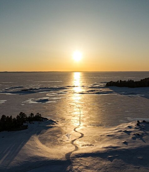 Sunset over snow-covered Lake Saint-Jean