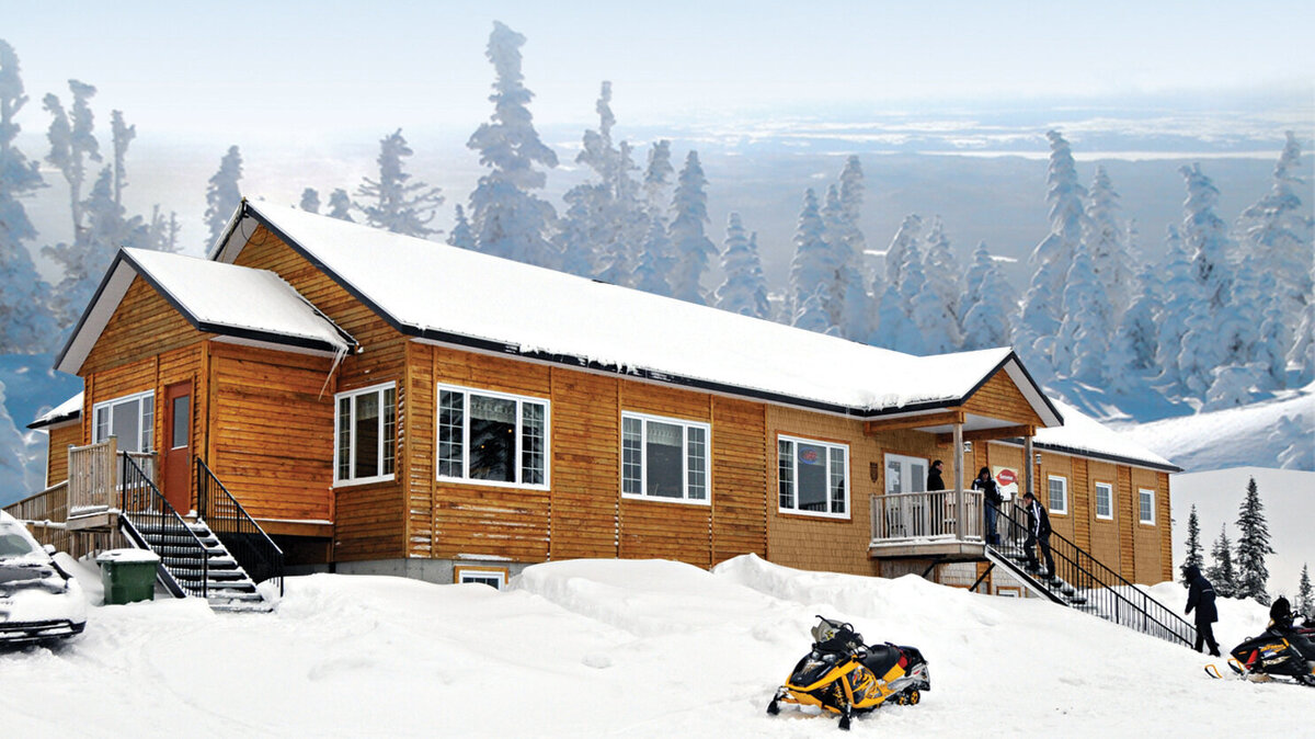 Large snow-covered cottage in the Monts Valin